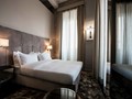 Corner Room du DOM Hotel, en Italie