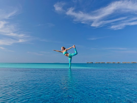Yoga face à l'océan
